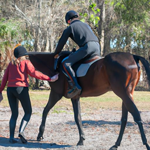 Apprentice rider receiving expert guidance during horse training sessions.
