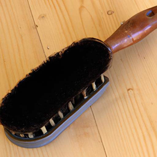 A horse owner demonstrating the effectiveness of using the best quality grooming brushes.