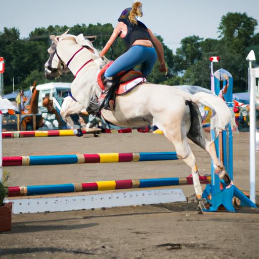 A skilled equestrian showcasing their show jumping prowess at the NYS Fair Horse Competition